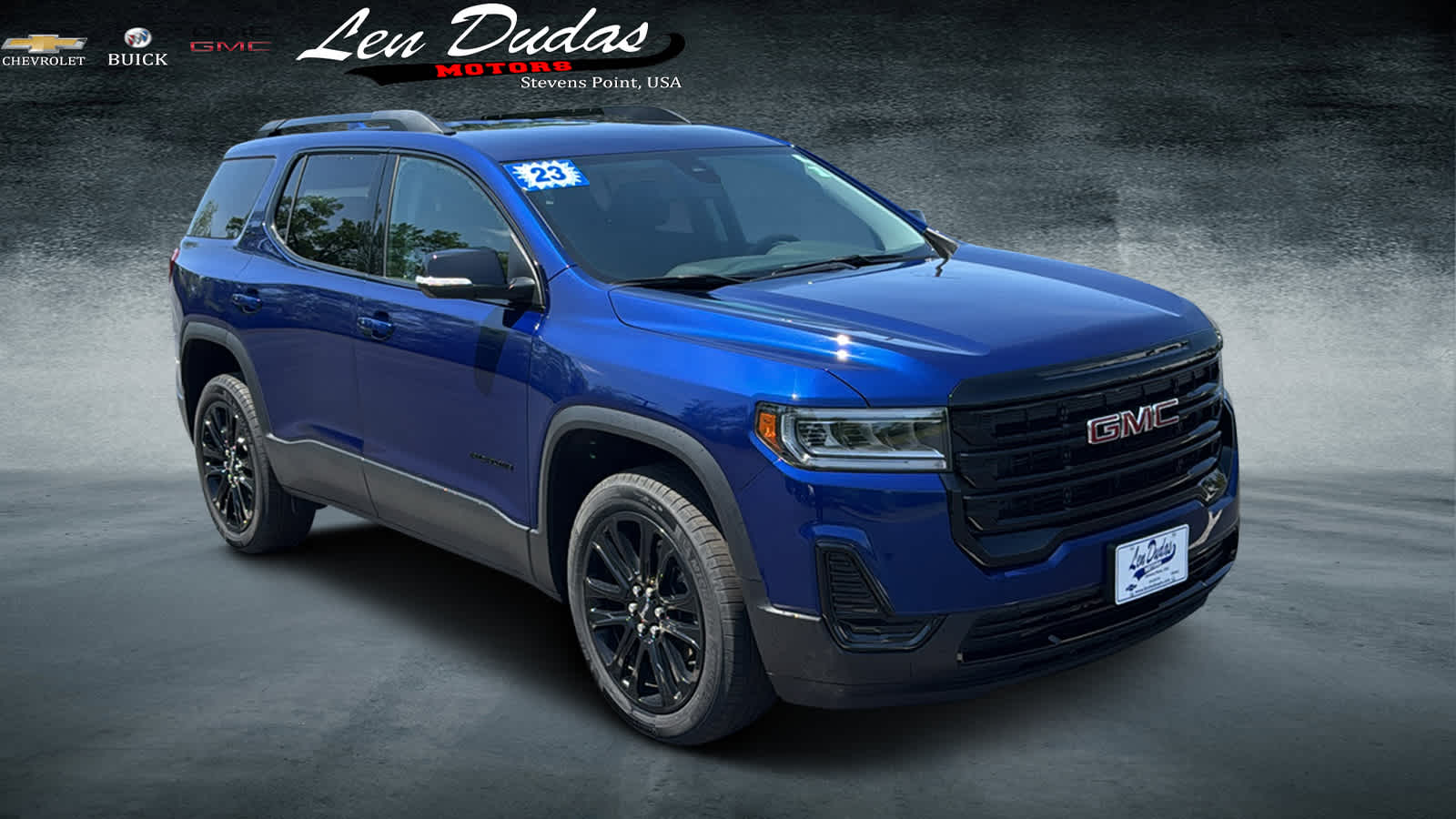 2023 GMC Acadia SLE in Ultra Blue Metallic — front three-quarter view