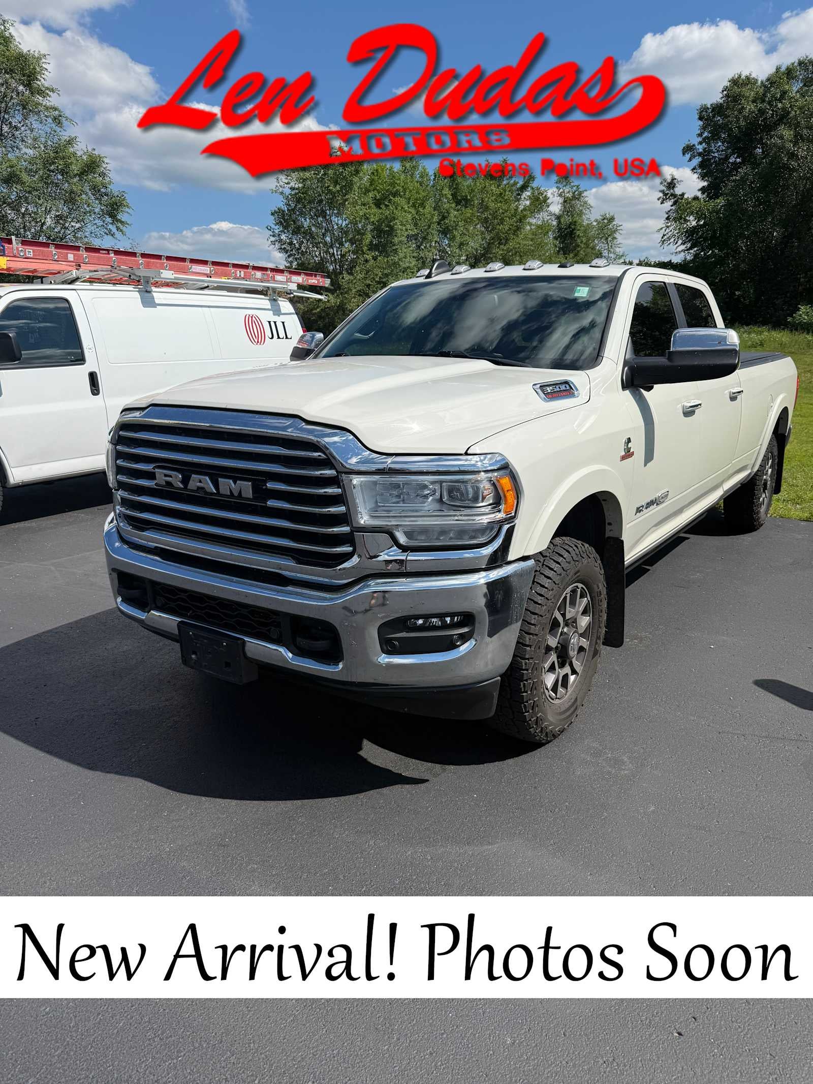 2021 RAM 3500 Limited Longhorn Crew Cab 4x4 8' Box in White — front three-quarter view